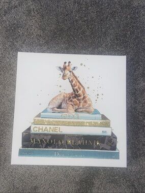 Giraffe Sitting on Luxury Fashion Books Canvas Art - Blue & Gold Accents
